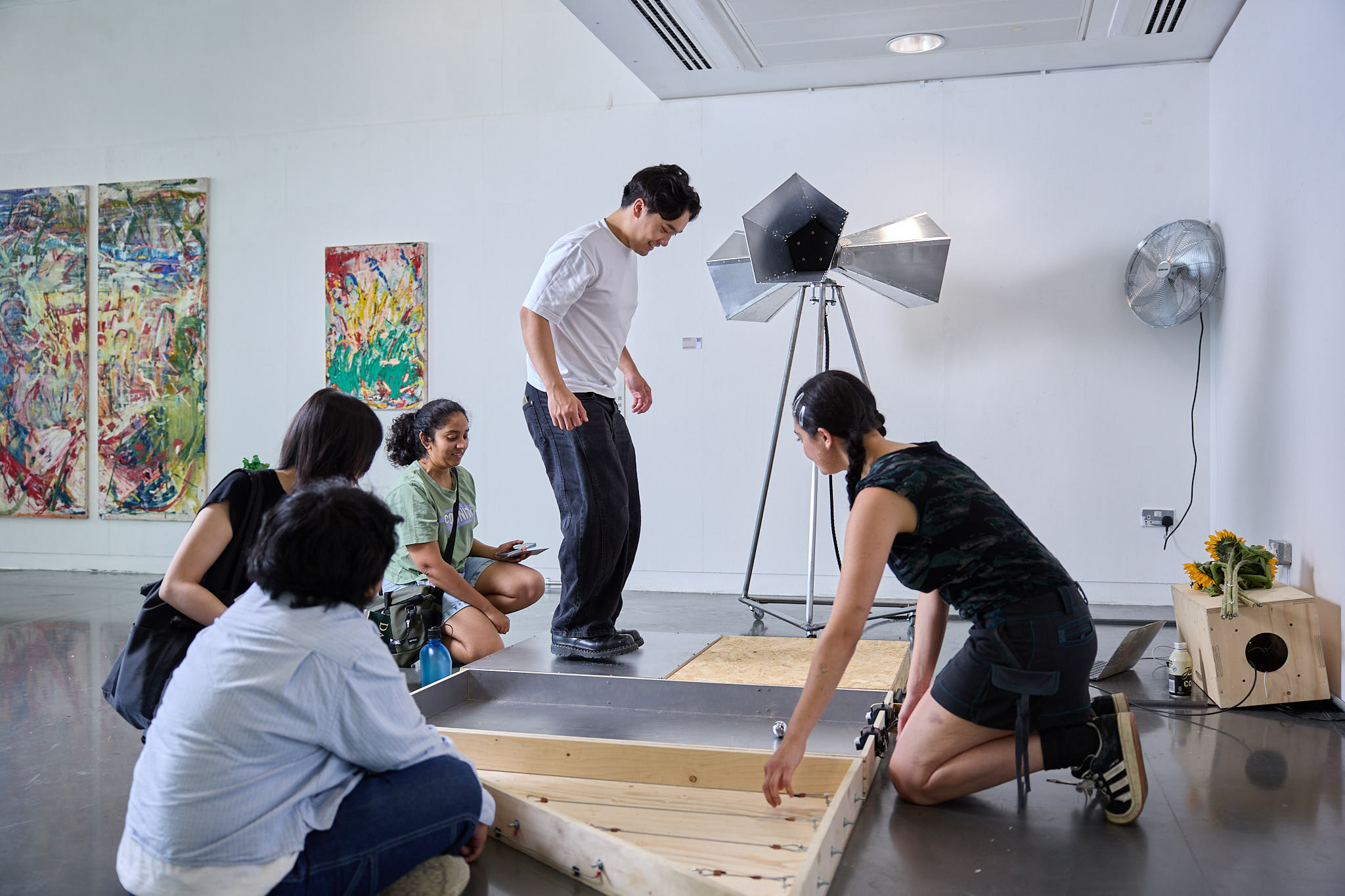 Image of students working in an art studio 